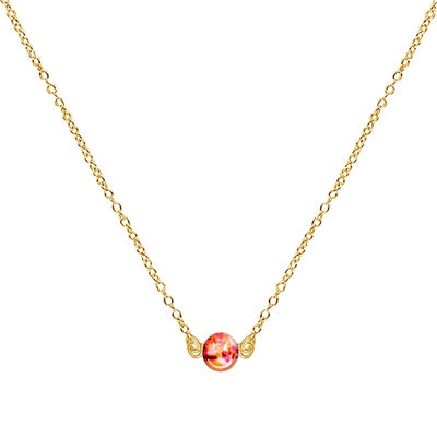 close up of dainty womens necklaces in gold filled chain with leukemia cell image in resin pendant 