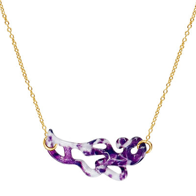 close up of purple paisley shaped pancreatic cancer cell image in resin pendant on adjustable gold filled chain